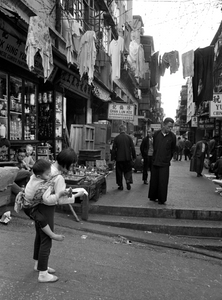 Redge Solley 'Hong Kong in the 60s' girl with baby - framed print